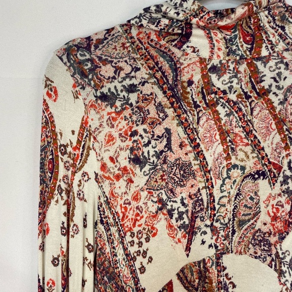 Boho and Gypsy style dress by Free People. Has an open back and elastic sleeves. - Picture 3 of 6